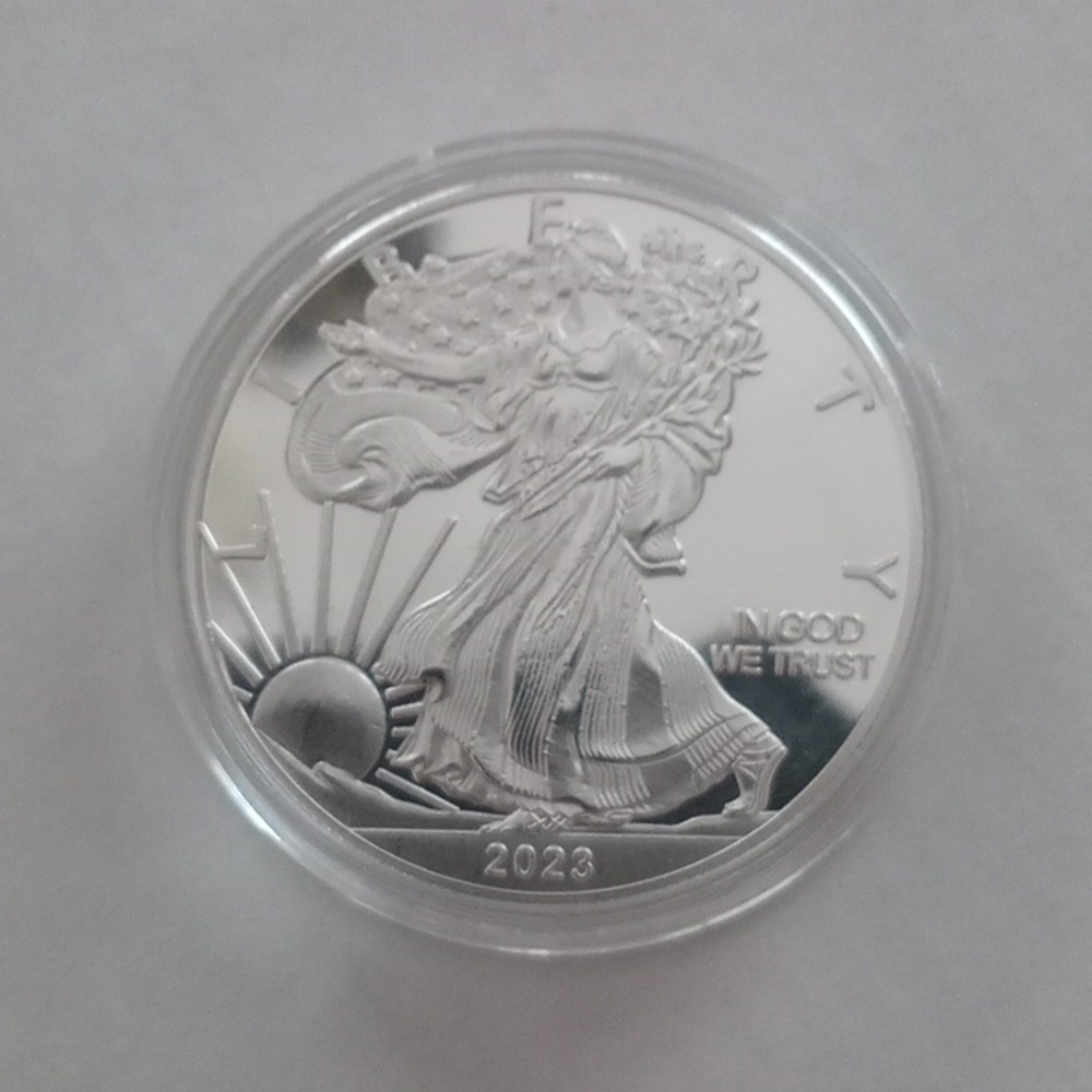 One ounce silver clad collectors souvenir coin in plastic capsule